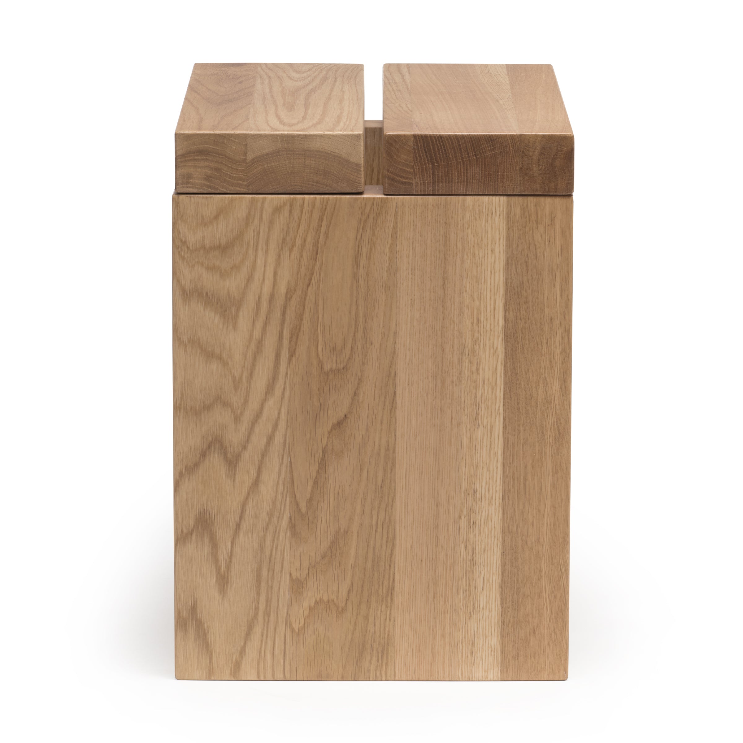 Lyster solid oak side table or stool, profile view on white background