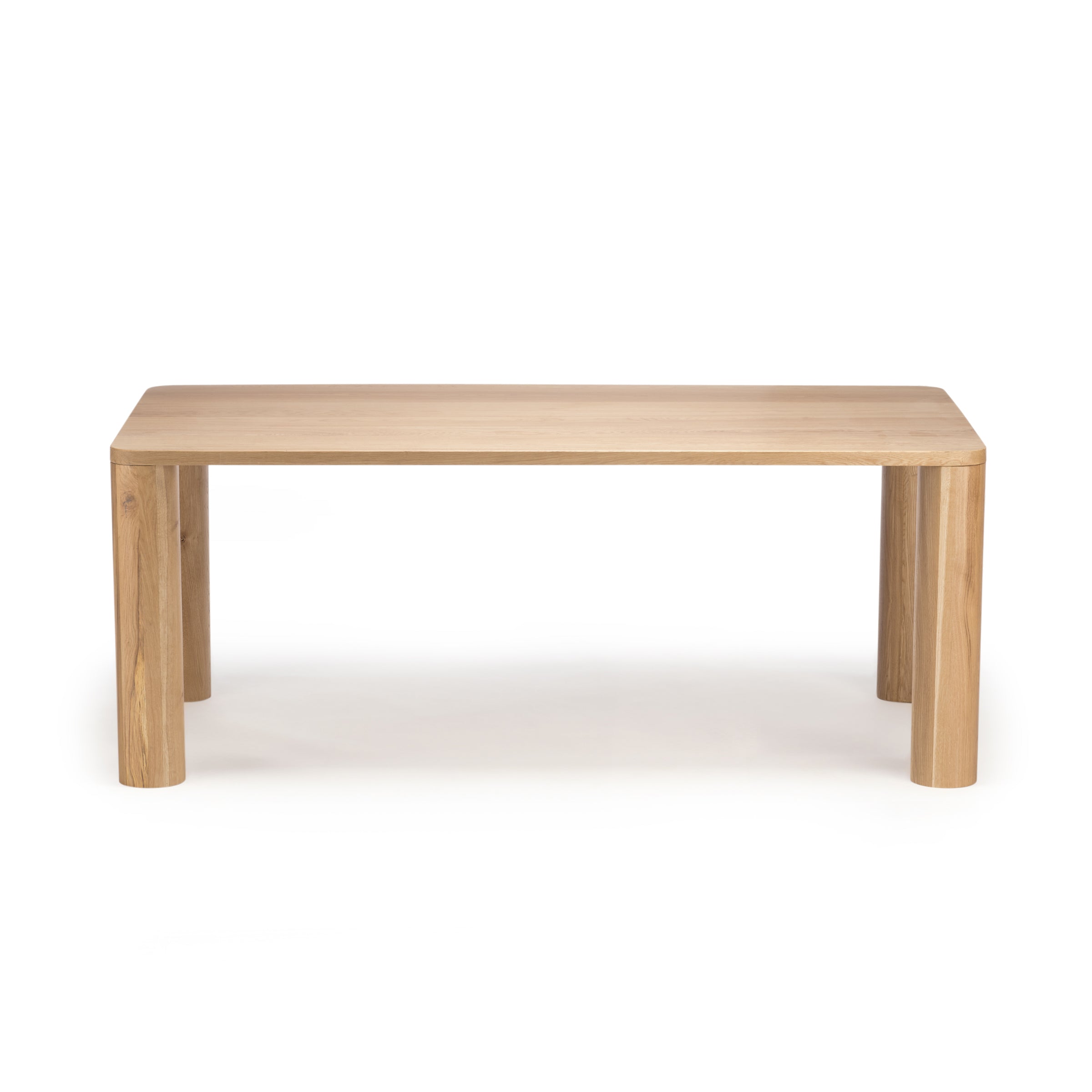 Tema dining table in solid oak, front view on white background