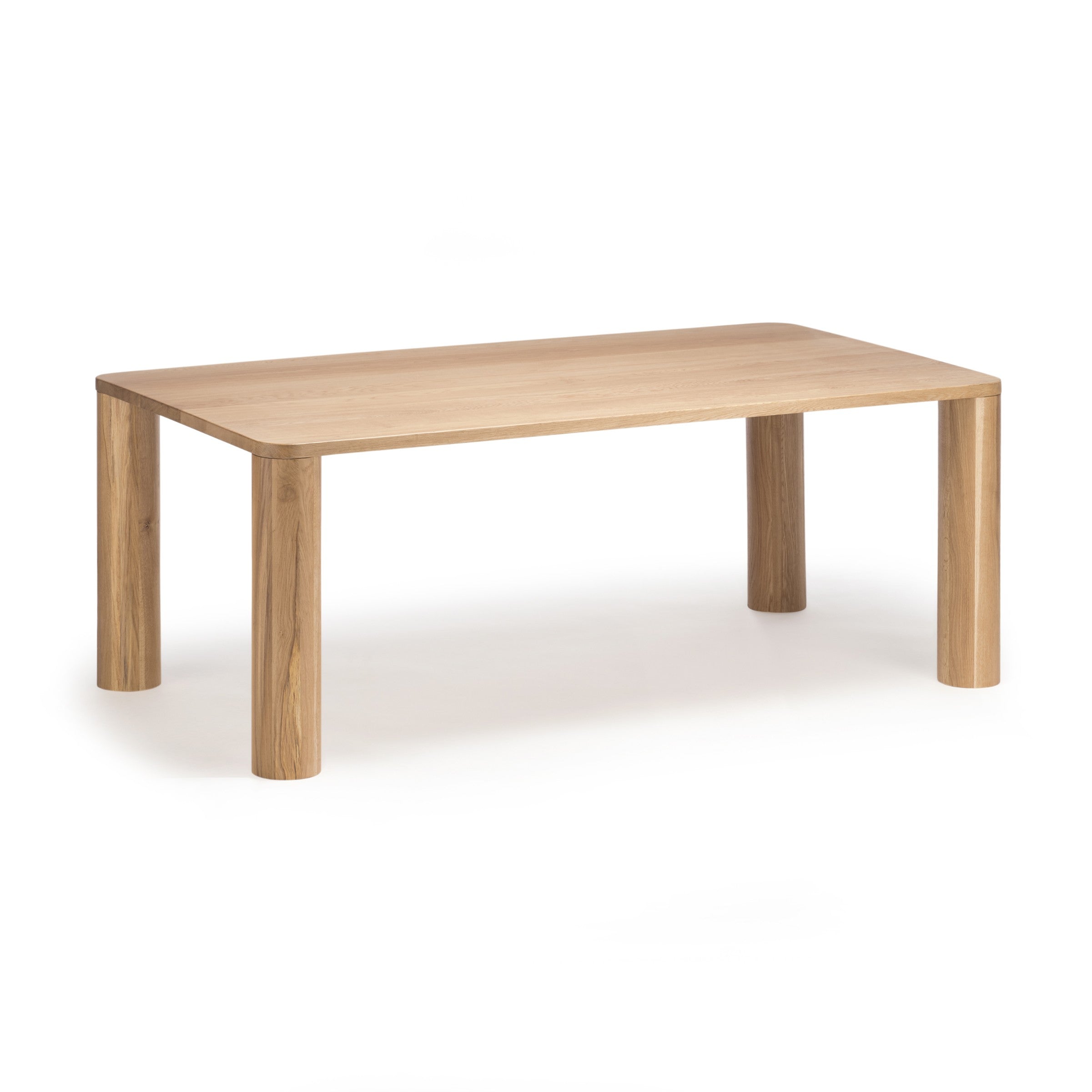 Tema dining table in solid oak, side view on white background