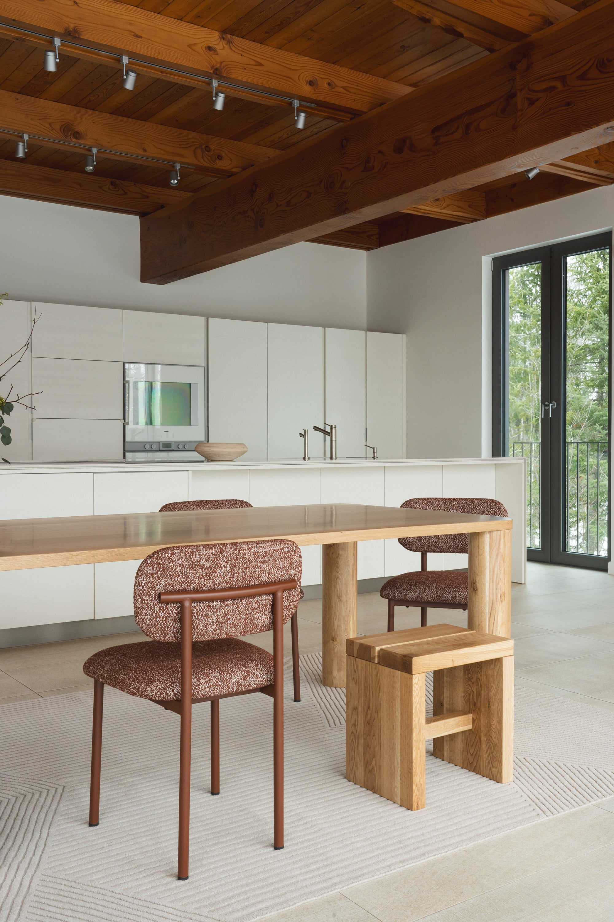 Mieux East collection dining room full set with table, chairs and a solid wood stool in a modern dining space
