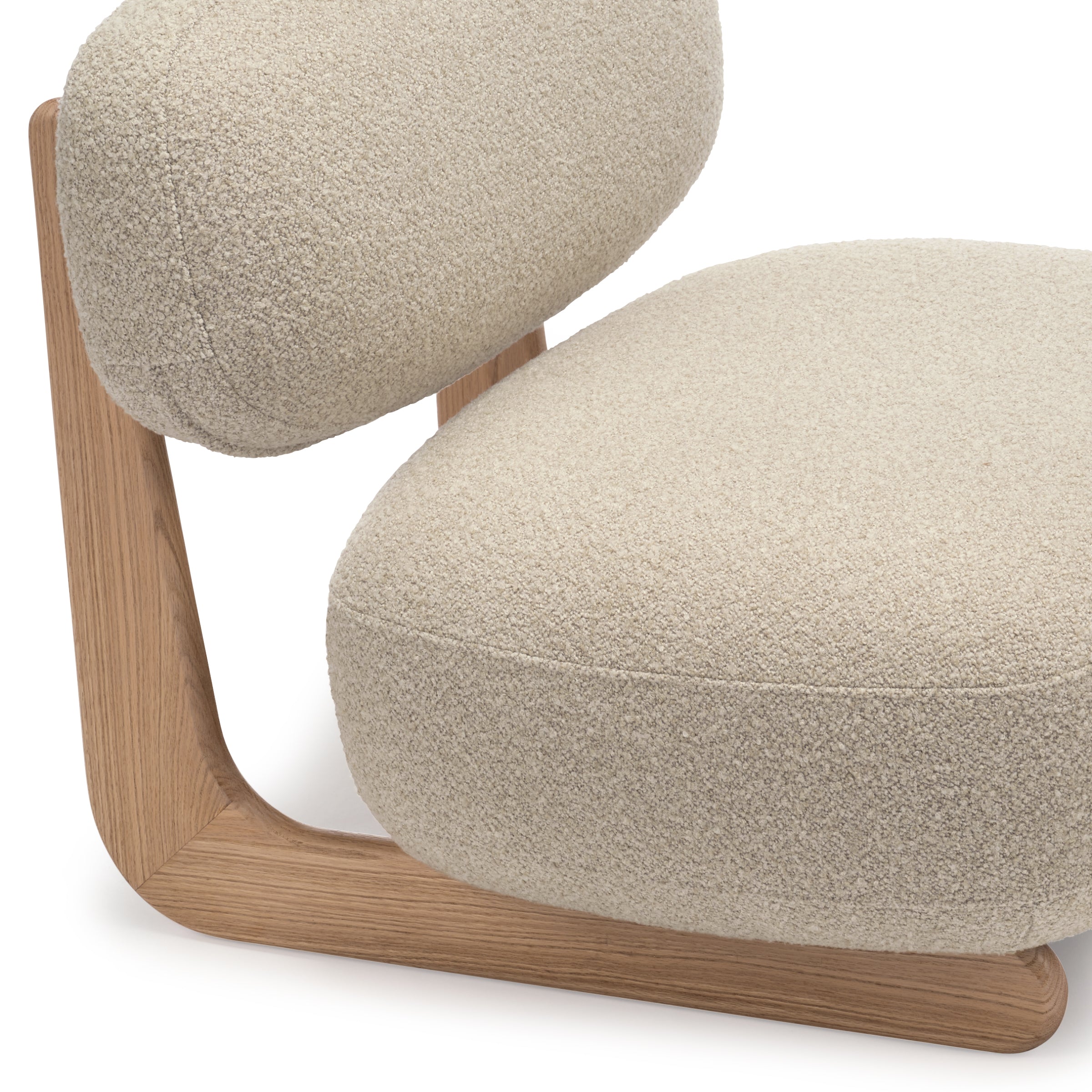 Sable lounge chair in Cloud fabric (cream), detail view on white background
